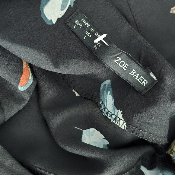 Cute lightweight black a-line dress with feathers - Picture 3 of 4